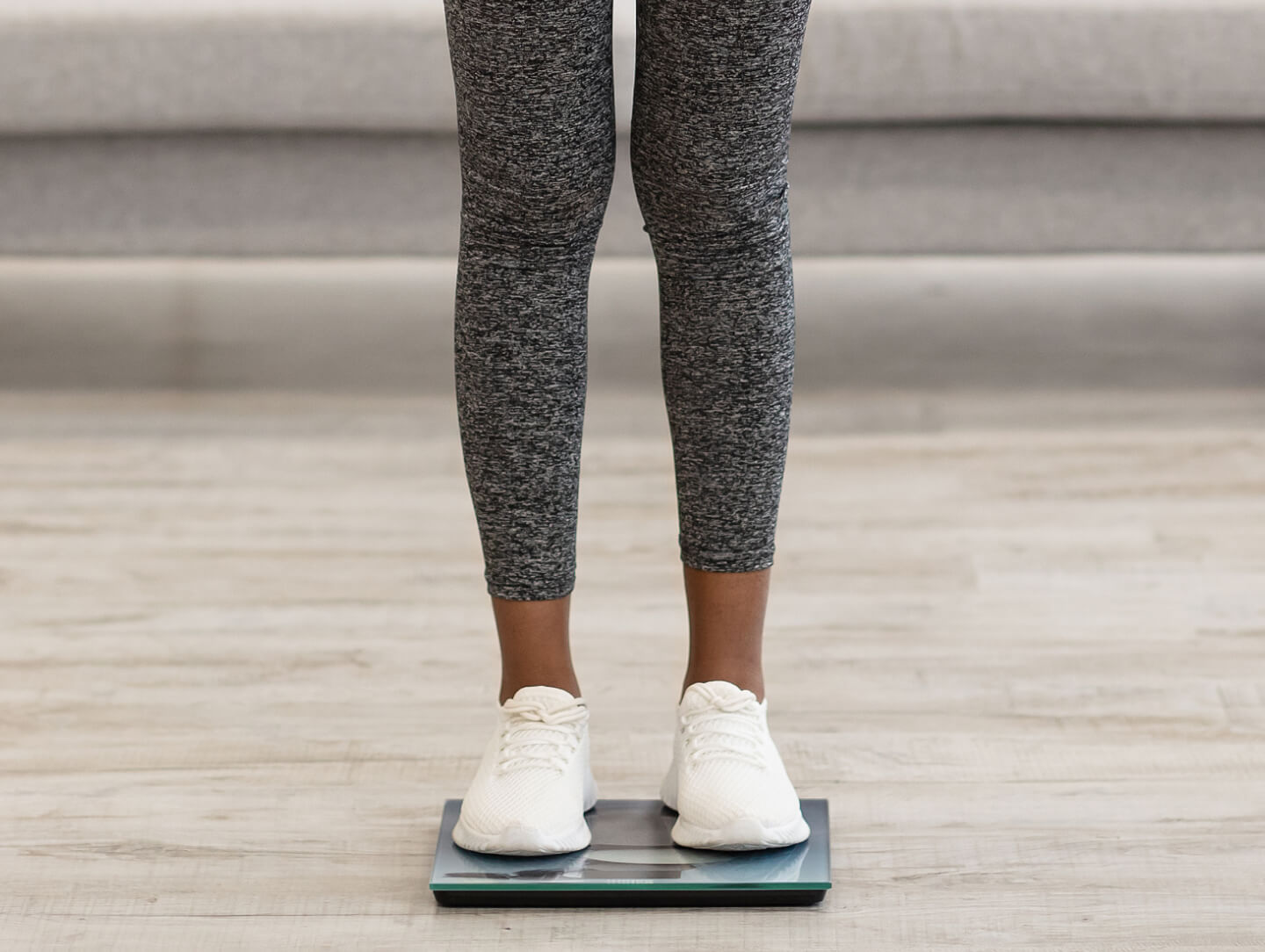 shocked-black-woman-weighing-herself-and-measuring-2023-11-27-05-21-45-utc 1 (2)