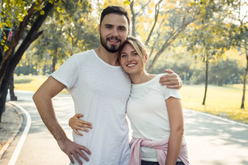 couples show love to each other in the park utc