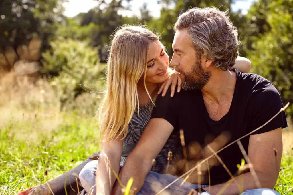 romantic couple sitting gazing at each other in ru utc